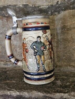 AVON Ceramic Football Scene Stein in Blue, Cream, and Brown $12